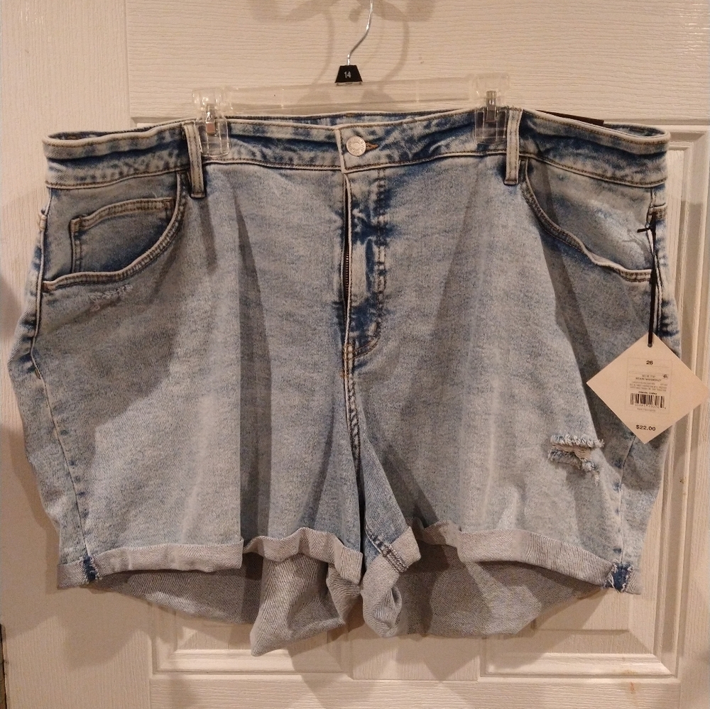 Denim shorts. Distressed with pockets. Stretchy. New